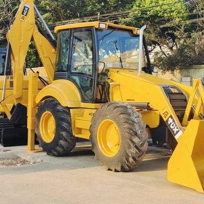 74.6кВт JCB 4CX Подержанный погрузчик Желтый 4378кг Подъемник Подержанный буровой погрузчик Колесо в движении
